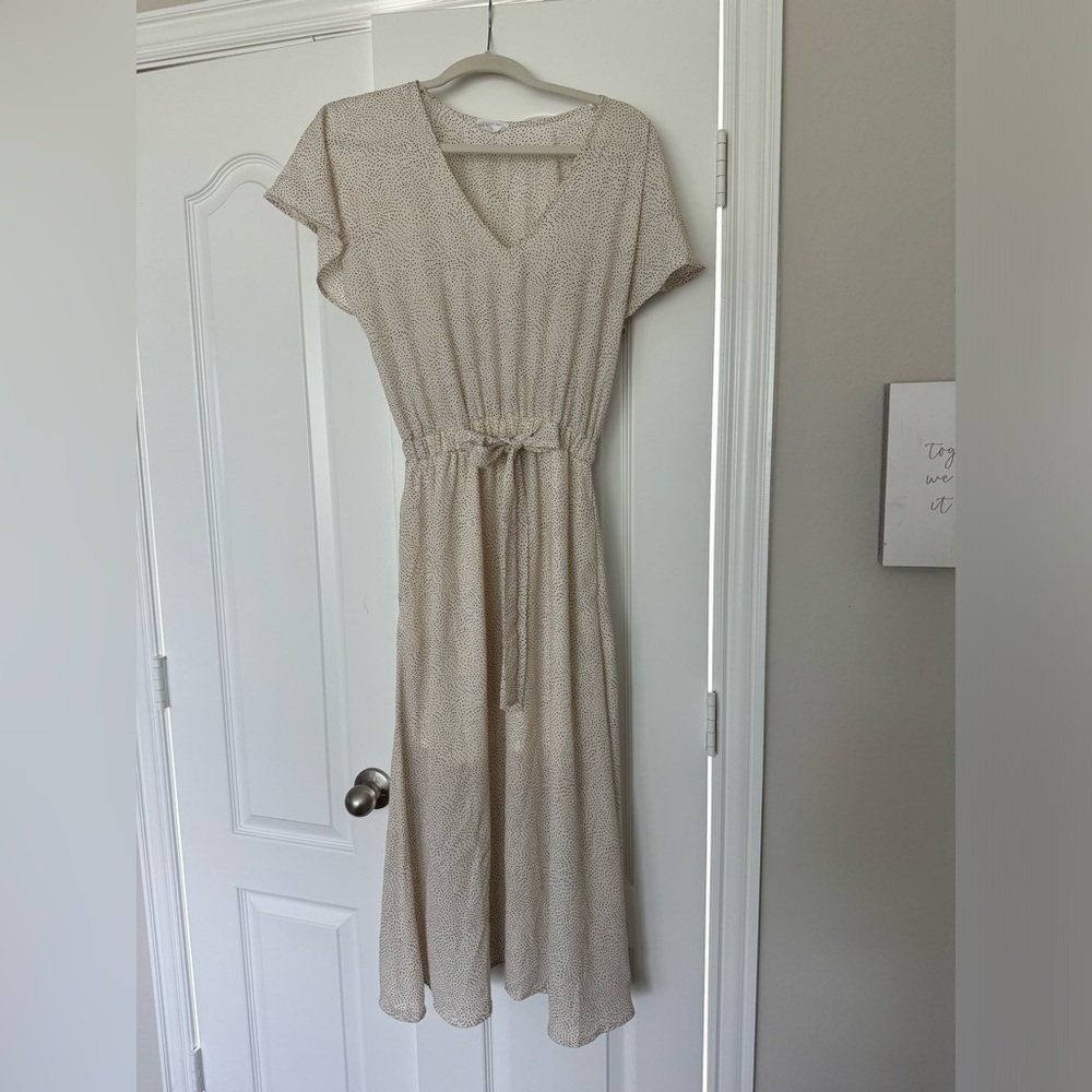 Sienna Sky ivory print dress tea length.